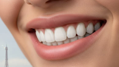 A close-up, photorealistic image of a natural, radiant smile with bright, healthy teeth, subtly framed. In the very soft, blurred background, the iconic silhouette of the Eiffel Tower is visible, hinting at Paris, France. There is no visible text.